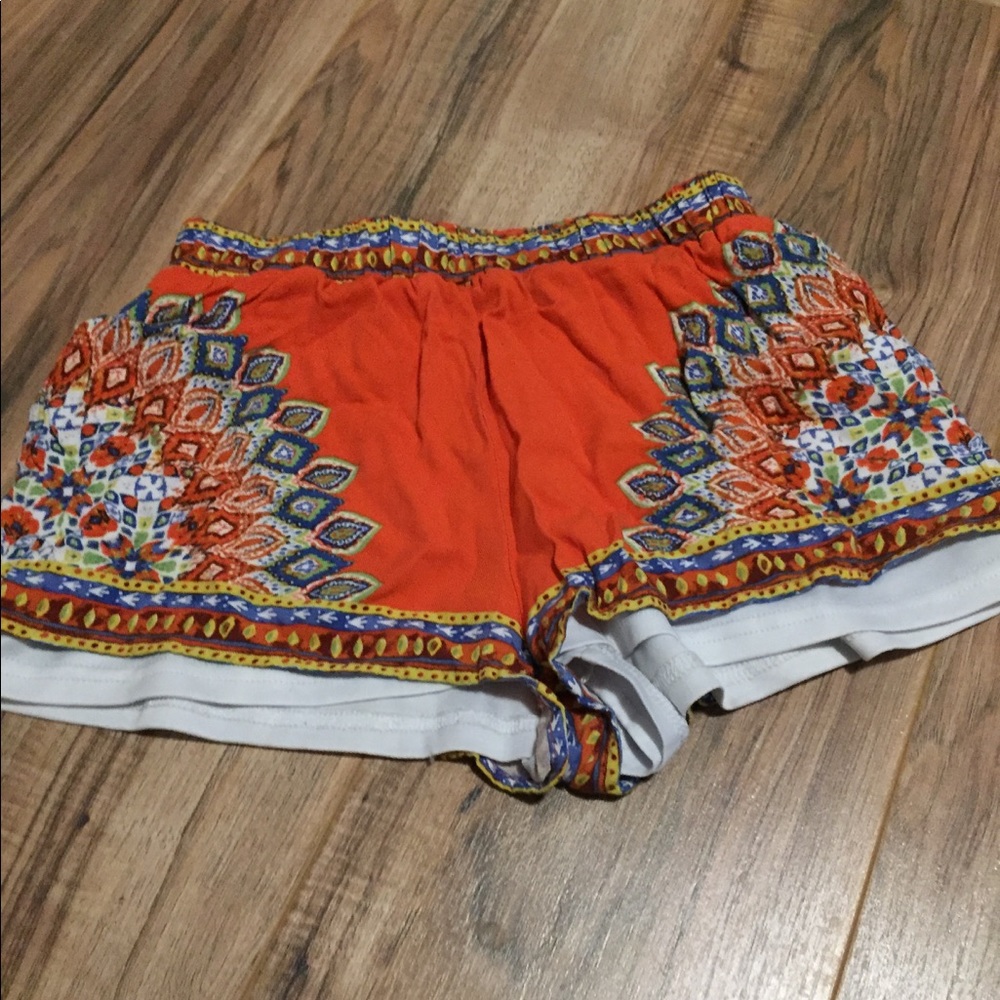 Flowy orange print shorts